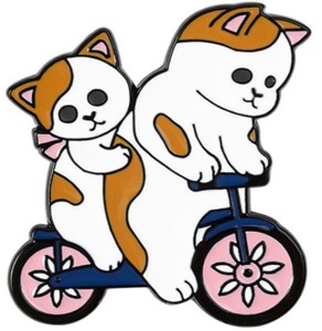 a bycicle with two cute kitties